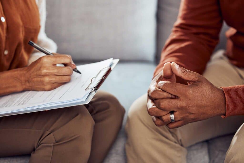 couple signing papers for legal separation